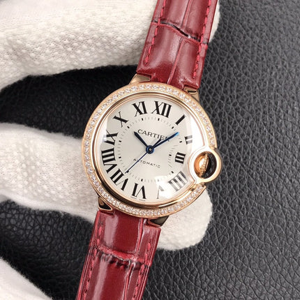 BALLON BLEU 33MM ROSE GOLD CASE DIAMOND BEZEL RED LEATHER