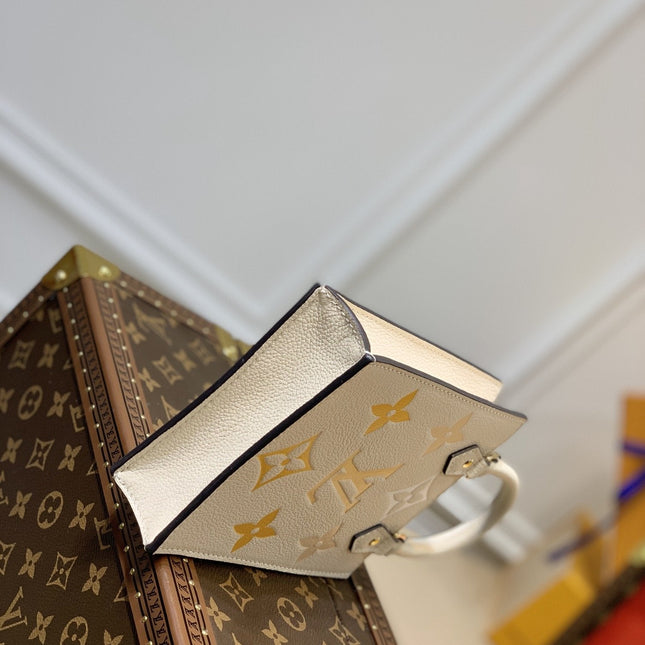 LV PETIT SAC PLAT CREAM MONOGRAM EMPREINTE COWHIDE LEATHER