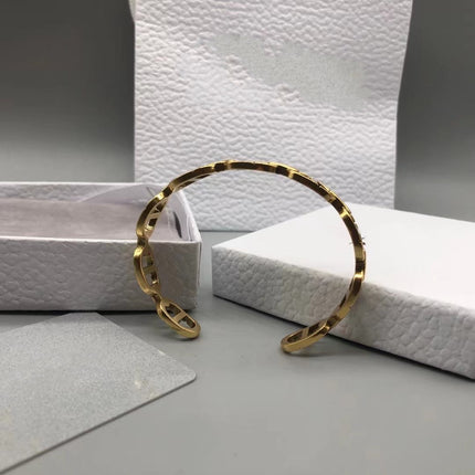 CD MOTIF GOLD CUFF BRACELET