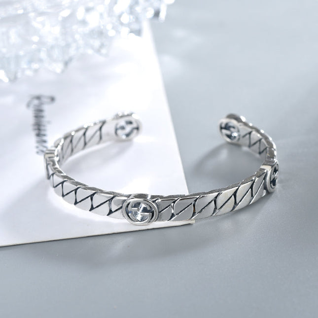 GG SILVER INTERLOCKING OPEN BRACELET