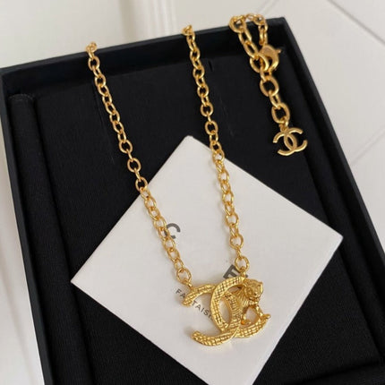 DOUBLE C TIGER GOLD NECKLACE