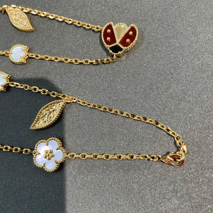 LUCKY SPRING 15 MOTIFS GOLD NECKLACE