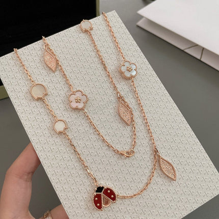 LUCKY SPRING 15 MOTIFS PINK GOLD NECKLACE