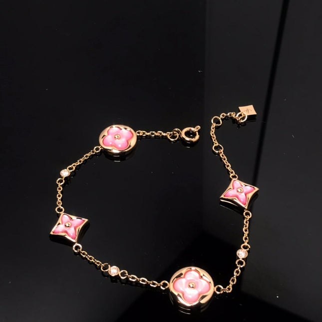 STAR AND SUN 4 MOTIF PINK MOP PINK GOLD BRACELET