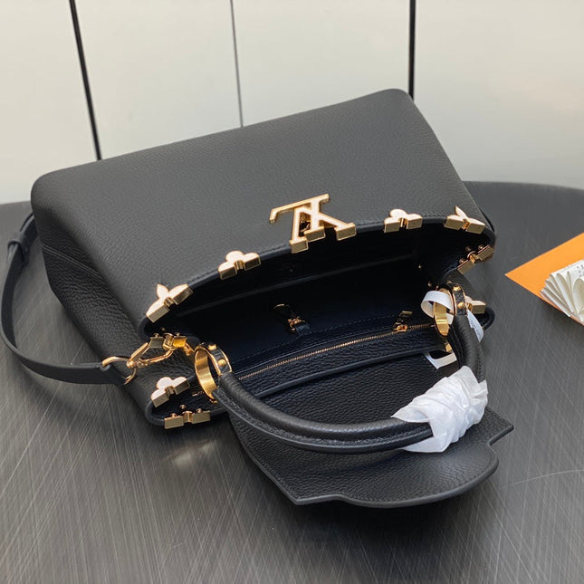 CAPUCINES MM 31 BLACK TAURILLON GOLD HARDWARE