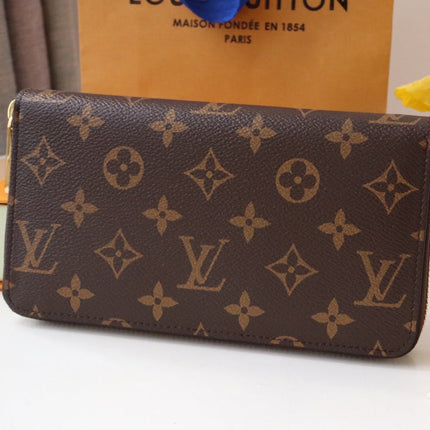 VIVIENNE ZIPPY WALLET 9.5 MONOGRAM CANVAS