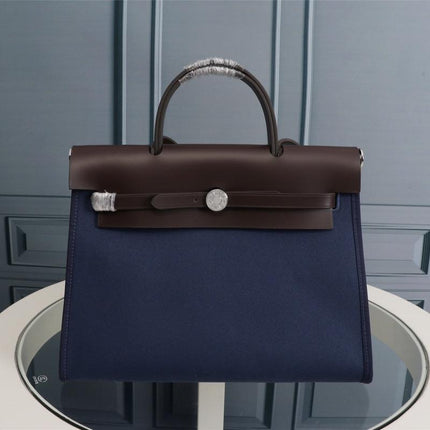 HM HERBAG ZIP 31 NAVY AND CHOCOLATE CANVAS