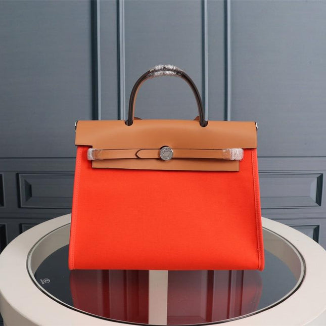 HM HERBAG ZIP 31 RED ORANGE AND COPPER CANVAS