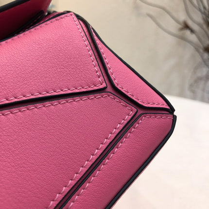 LOE MINI 18 PUZZLE BAG IN DEEP PINK CALFSKIN