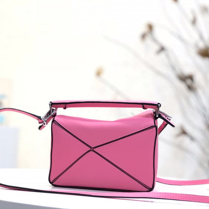 LOE MINI 18 PUZZLE BAG IN DEEP PINK CALFSKIN