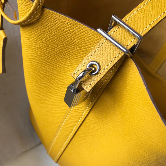 HM PICOTIN LOCK 22 YELLOW CALFSKIN WITH BRAID STRAP