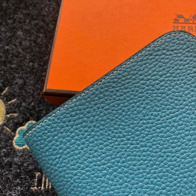 TOGO PASSPORT HOLDER 20 IN CERULEAN BLUE CALFSKIN