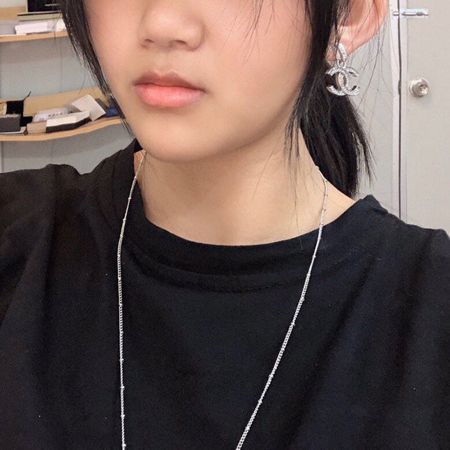 DOUBLE C STUD EARRINGS IN SILVER METAL FULL WHITE CRYSTALS