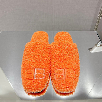 BALENCIAGA 25S MULES IN ORANGE WOOL WITH LOGO