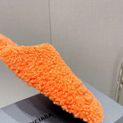 BALENCIAGA 25S MULES IN ORANGE WOOL WITH LOGO