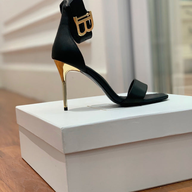BALMAIN 25S THIN STRAP HIGH HEELS 105MM IN BLACK CALFSKIN GOLD HARDWARE