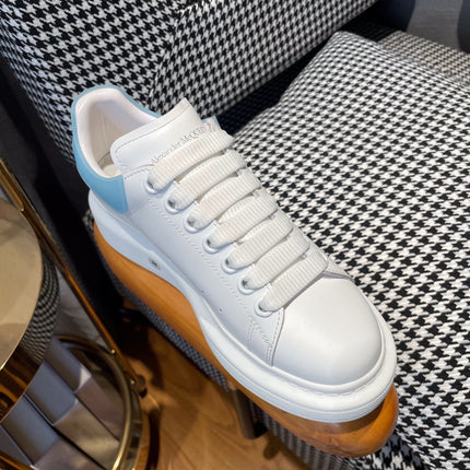 OVERSIZED SNEAKERS IN WHITE CALFSKIN WITH BLUE RUBBER HEEL TAB
