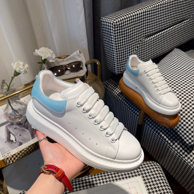 OVERSIZED SNEAKERS IN WHITE CALFSKIN WITH BLUE RUBBER HEEL TAB
