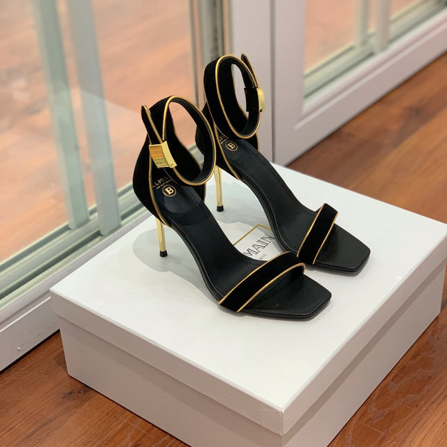 BALMAIN 25S UMA HEELED SANDALS 105MM IN BLACK SUEDE GOLD HARDWARE