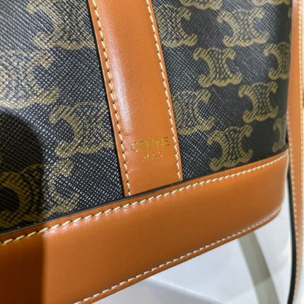 BUCKET 30 IN BLACK TRIOMPHE CANVAS AND RED BROWN CALFSKIN TRIM