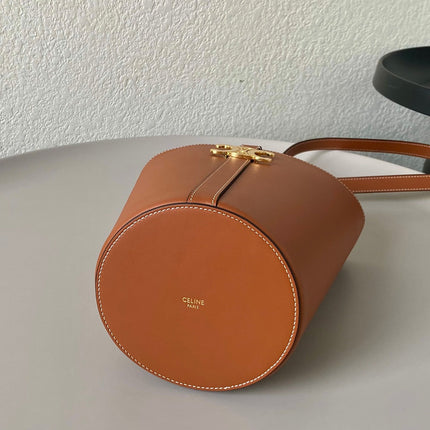 TRIOMPHE 25 BUCKET BAG CINNAMON BROWN CALFSKIN