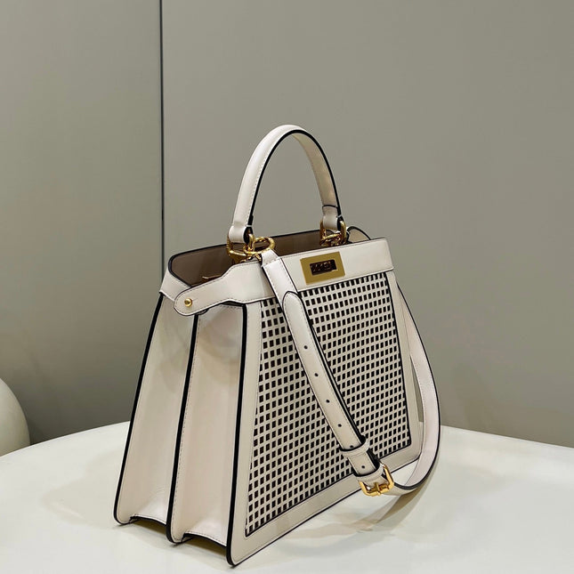 PEEKABOO ISEEU 34 IN WHITE PERFORATED CALFSKIN GOLD HARDWARE