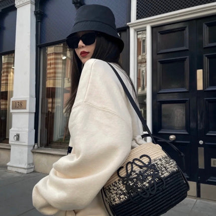 LOE 18 ANAGRAM BASKET BAG IN BLACK AND NATURAL RAFFIA