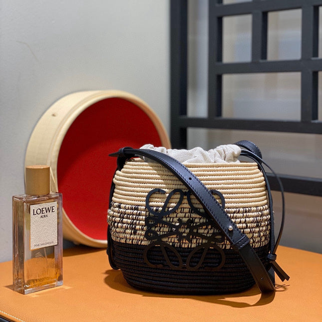 LOE 18 ANAGRAM BASKET BAG IN BLACK AND NATURAL RAFFIA