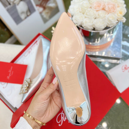 EFFLORESCENCE POINTED-TOE PUMPS IN SILVER SATIN WITH CRYSTAL BUCKLE