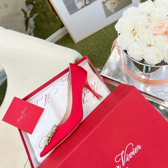 EFFLORESCENCE POINTED-TOE PUMPS IN RED SATIN WITH CRYSTAL BUCKLE