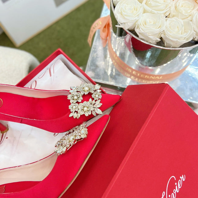 EFFLORESCENCE POINTED-TOE PUMPS IN RED SATIN WITH CRYSTAL BUCKLE