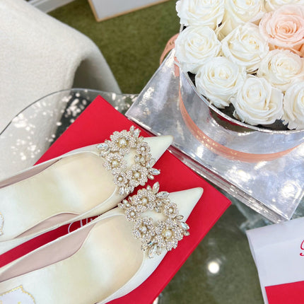 EFFLORESCENCE POINTED-TOE PUMPS IN WHITE SATIN WITH CRYSTAL BUCKLE