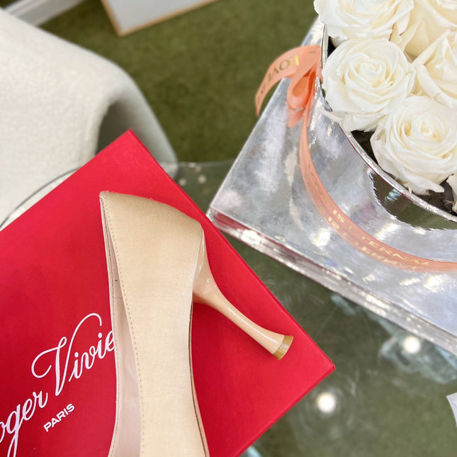 EFFLORESCENCE POINTED-TOE PUMPS IN NUDE SATIN WITH CRYSTAL BUCKLE