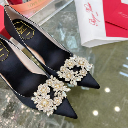 EFFLORESCENCE POINTED-TOE PUMPS IN BLACK SATIN WITH CRYSTAL BUCKLE