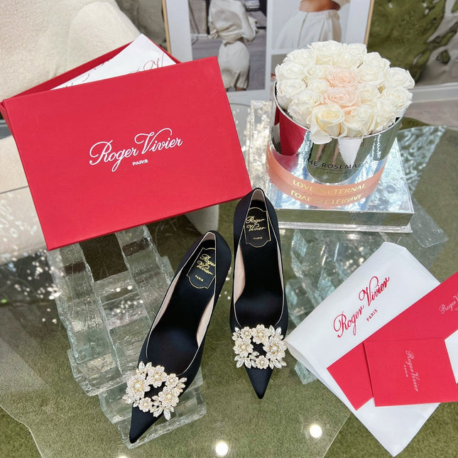 EFFLORESCENCE POINTED-TOE PUMPS IN BLACK SATIN WITH CRYSTAL BUCKLE