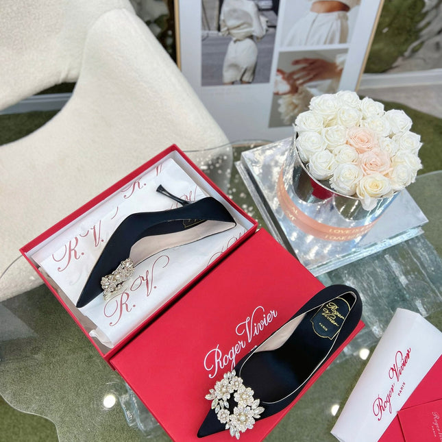 EFFLORESCENCE POINTED-TOE PUMPS IN BLACK SATIN WITH CRYSTAL BUCKLE