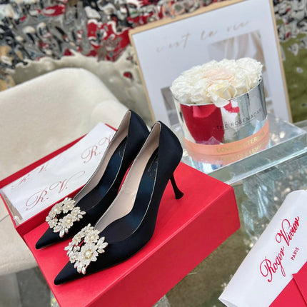 EFFLORESCENCE POINTED-TOE PUMPS IN BLACK SATIN WITH CRYSTAL BUCKLE