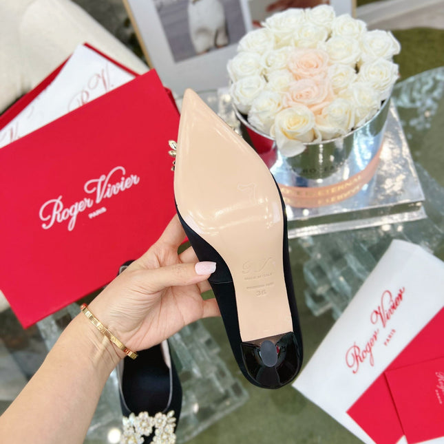 EFFLORESCENCE POINTED-TOE PUMPS IN BLACK SATIN WITH CRYSTAL BUCKLE