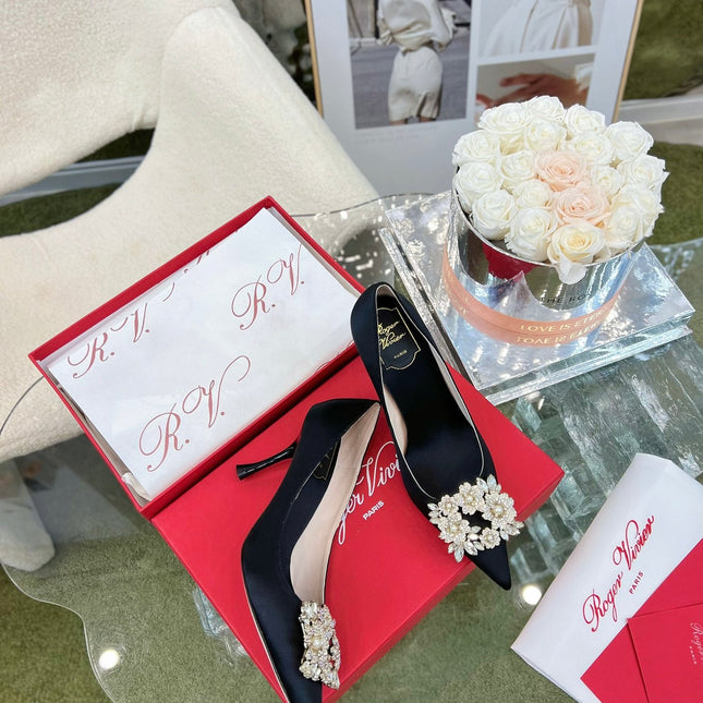 EFFLORESCENCE POINTED-TOE PUMPS IN BLACK SATIN WITH CRYSTAL BUCKLE