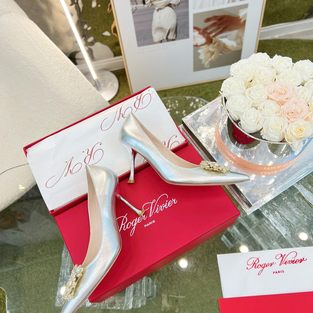 EFFLORESCENCE POINTED-TOE PUMPS 85MM IN SILVER SATIN WITH CRYSTAL BUCKLE