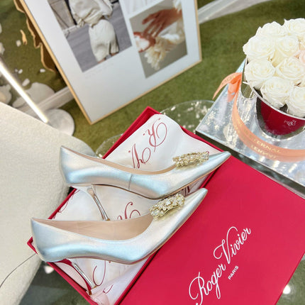 EFFLORESCENCE POINTED-TOE PUMPS 85MM IN SILVER SATIN WITH CRYSTAL BUCKLE