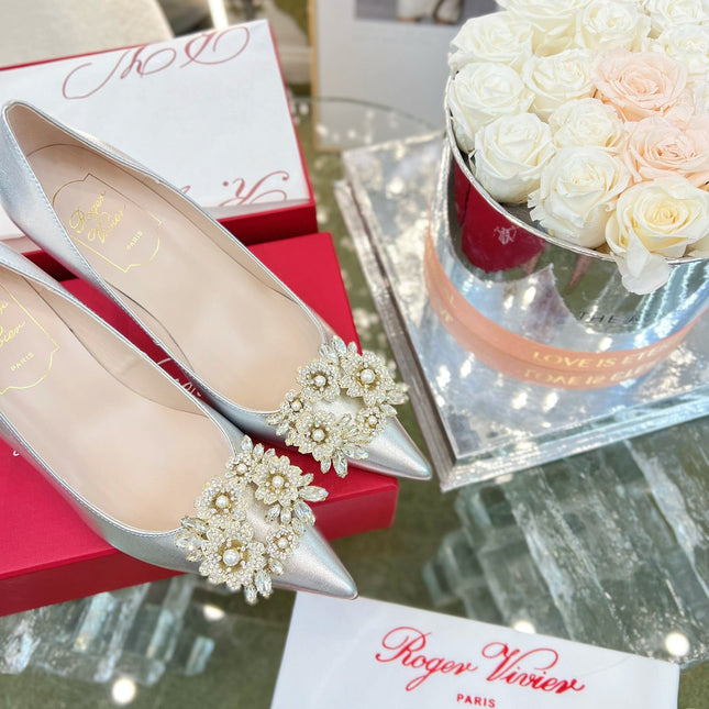 EFFLORESCENCE POINTED-TOE PUMPS 85MM IN SILVER SATIN WITH CRYSTAL BUCKLE