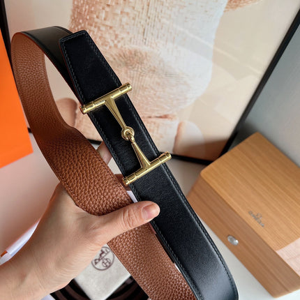 HM JUMBO BELT BUCKLE & REVERSIBLE CIDER ORANGE AND BLACK LEATHER STRAP 38 MM GOLD HARDWARE