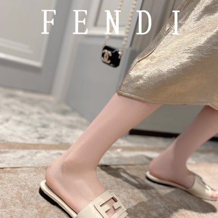 FENDI BAGUETTE SLIDES IN WHITE LAMBSKIN