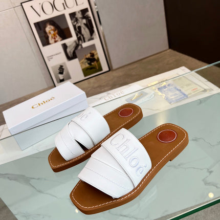 CHLOÉ WOODY MULE IN WHITE LAMBSKIN WITH EMBROIDERED LOGO