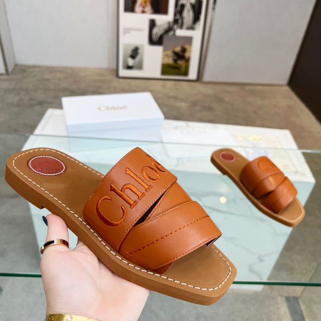 WOODY MULE IN BRONZE BROWM LAMBSKIN WITH EMBROIDERED LOGO