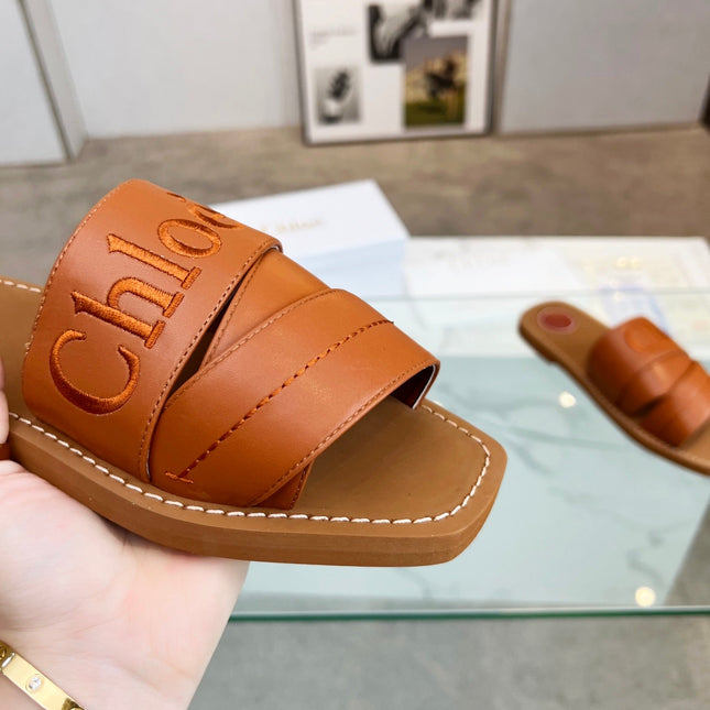 WOODY MULE IN BRONZE BROWM LAMBSKIN WITH EMBROIDERED LOGO