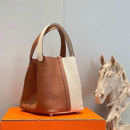 HM PICOTIN LOCK 22 BROWN AND WHITE CALFSKIN