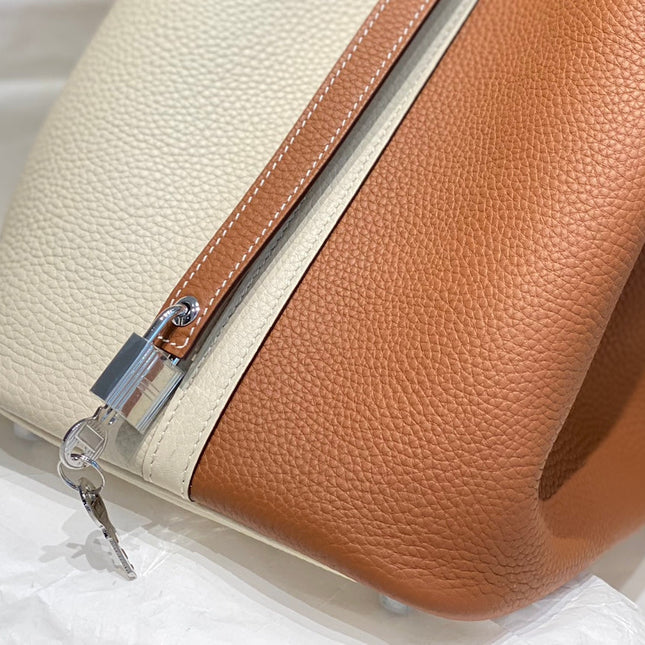 HM PICOTIN LOCK 22 BROWN AND WHITE CALFSKIN