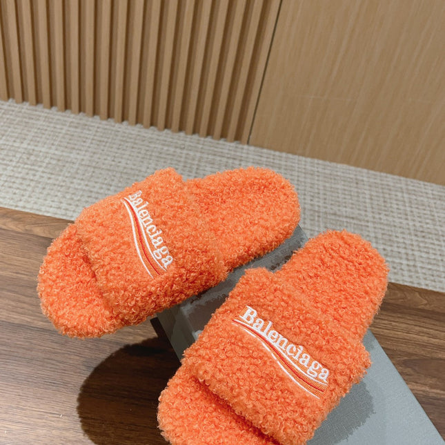 FURRY SLIDES IN ORANGE CURLY SHEARLING
